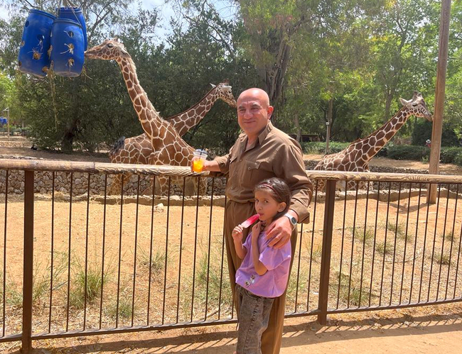 Niyan and father at zoo